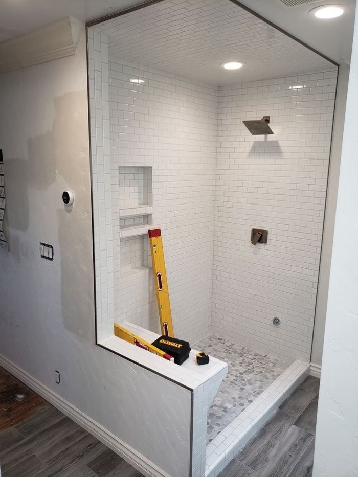 Finished subway tile shower ready for glass measurement